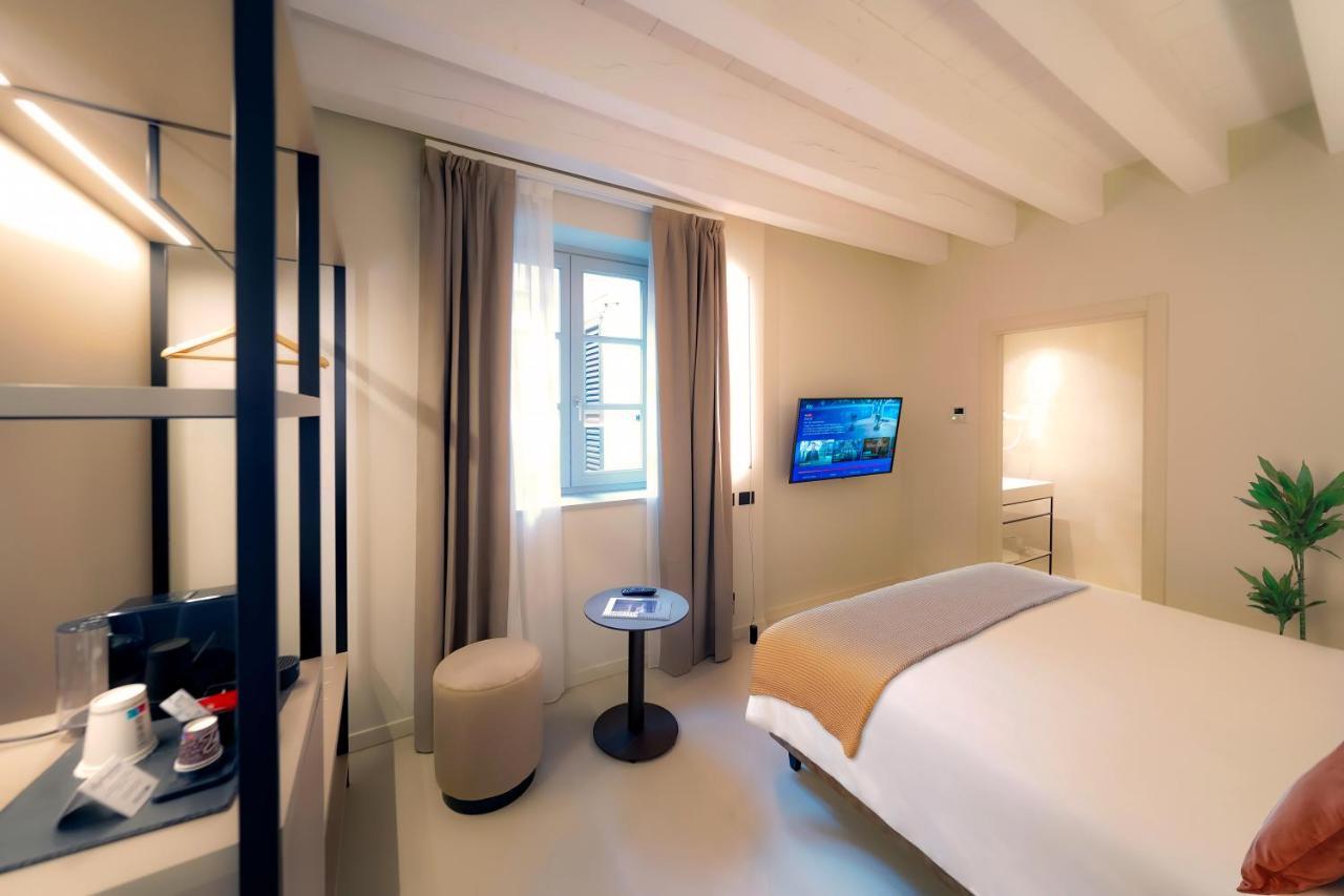 Bergamo Inn 21 Экстерьер фото A room at the hotel