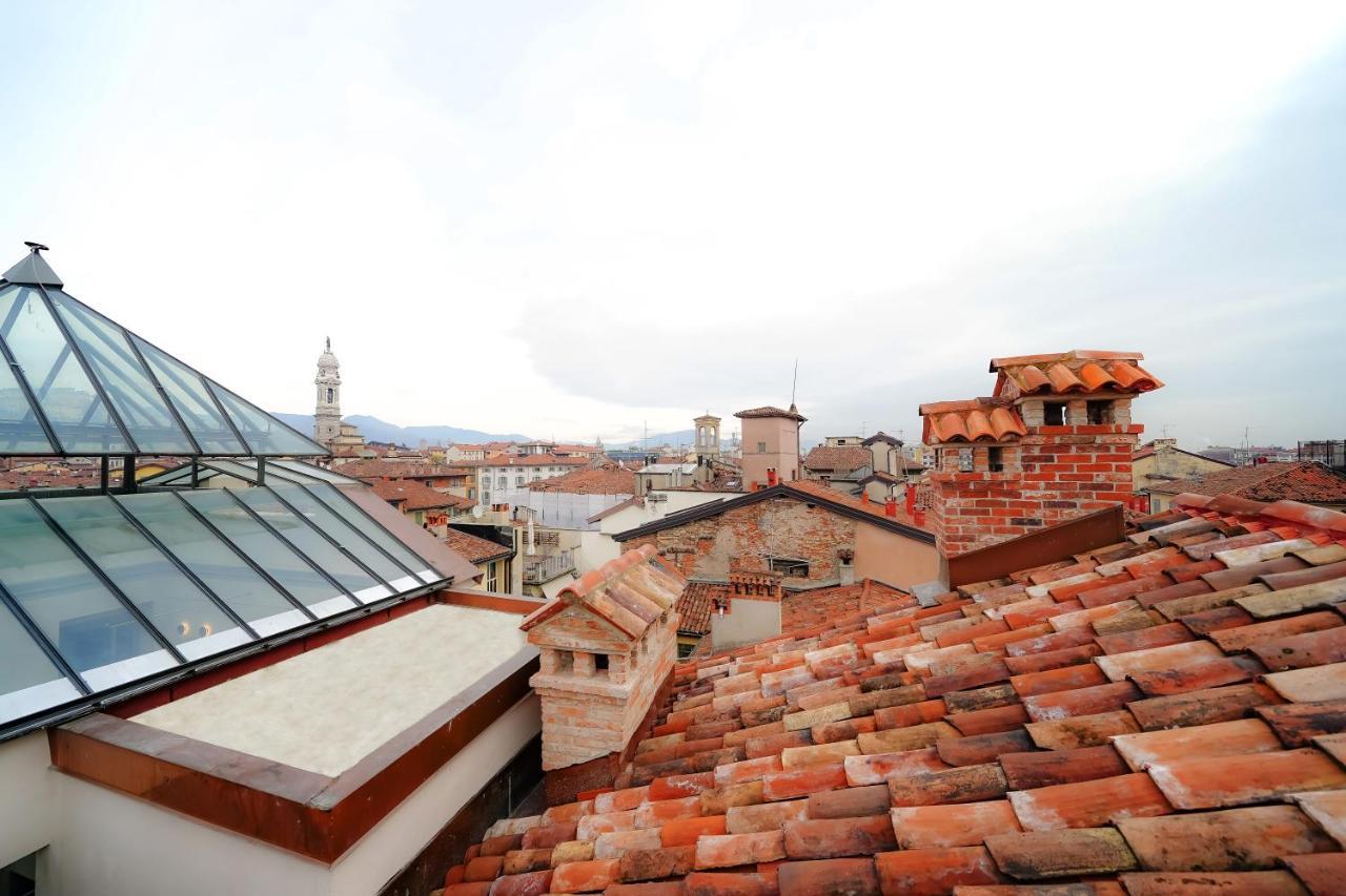 Bergamo Inn 21 Экстерьер фото View of the roofs of the city